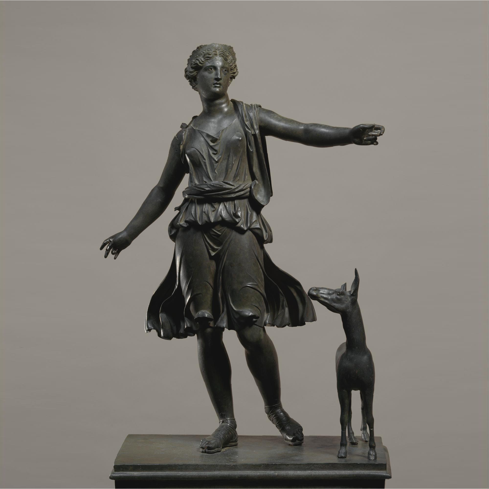 Bronze Artemis and a deer statue